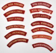 Quantity of thirteen Woven cloth 20th Century Second World War and Post War shoulder Titles to