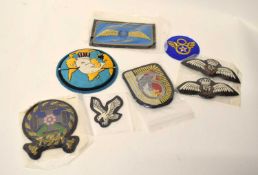 Quantity of modern and reproduction military insignia to include American USSAF 8th bomber group,