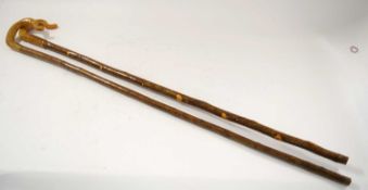 Two shepherds crooks walking sticks / stalking sticks with horn handles. One example with ribbed