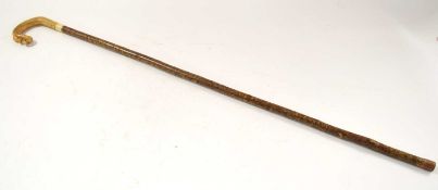 A shepherds crook walking stick / stalking stick with carved Scottish thistle horn handle overall