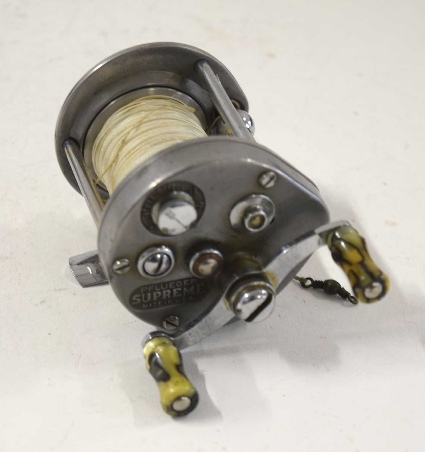 Quantity of three assorted fishing reels to include: Pflueger Supreme fishing reel – made in U.S. - Image 4 of 5