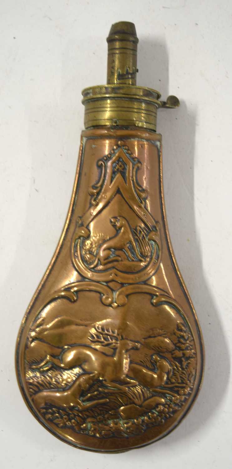 Three 19th century brass and copper powder flasks to include copper powder flask with dogs and a - Image 5 of 10