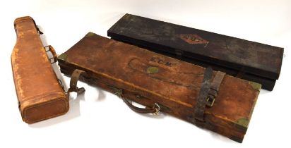 Three leather gun cases to include leg of mutton gun case and two leather shotgun travelling