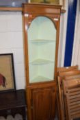 A small corner cabinet with cupboard base (Item 111 on vendor list)