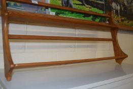 An Ercol light elm wall shelf, 96cm wide