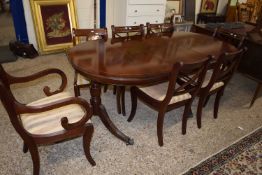 A reproduction mahogany twin pedestal dining table and seven accompanying chairs (8)
