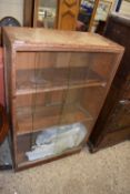 A small oak bookcase cabinet with sliding glass doors (a/f)