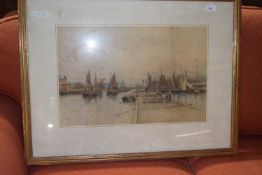 Watercolour study of a dockside scene with boats, framed and glazed but heavily foxed