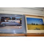 Photographic print of a summer field and a further print of a motor car