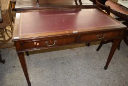 Reproduction mahogany two drawer writing table with leather inset top, 122cm wide