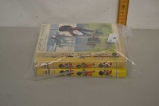 A group of three books by Enid Blyton and Agatha Christie