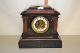 A Victorian black slate and marble cased mantel clock