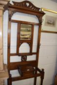 An early 20th Century mirror back oak hall stand (Item 49 on vendor list)