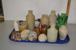 A tray of various assorted fossils, vintage bottles etc