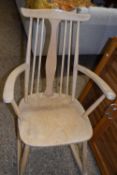 A mid Century stick back rocking chair, possibly Ercol