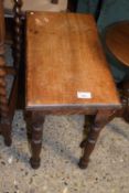 A small oak stool on turned legs (Item 75 on vendor list)