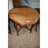 An Edwardian inlaid octagonal two tiered occasional table (Item 90 on vendor list)