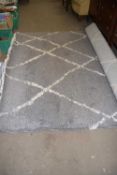 A modern grey and white rug approx 200 x 290cm