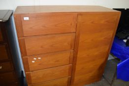 A mid to late 20th Century chest of drawers/cupboard