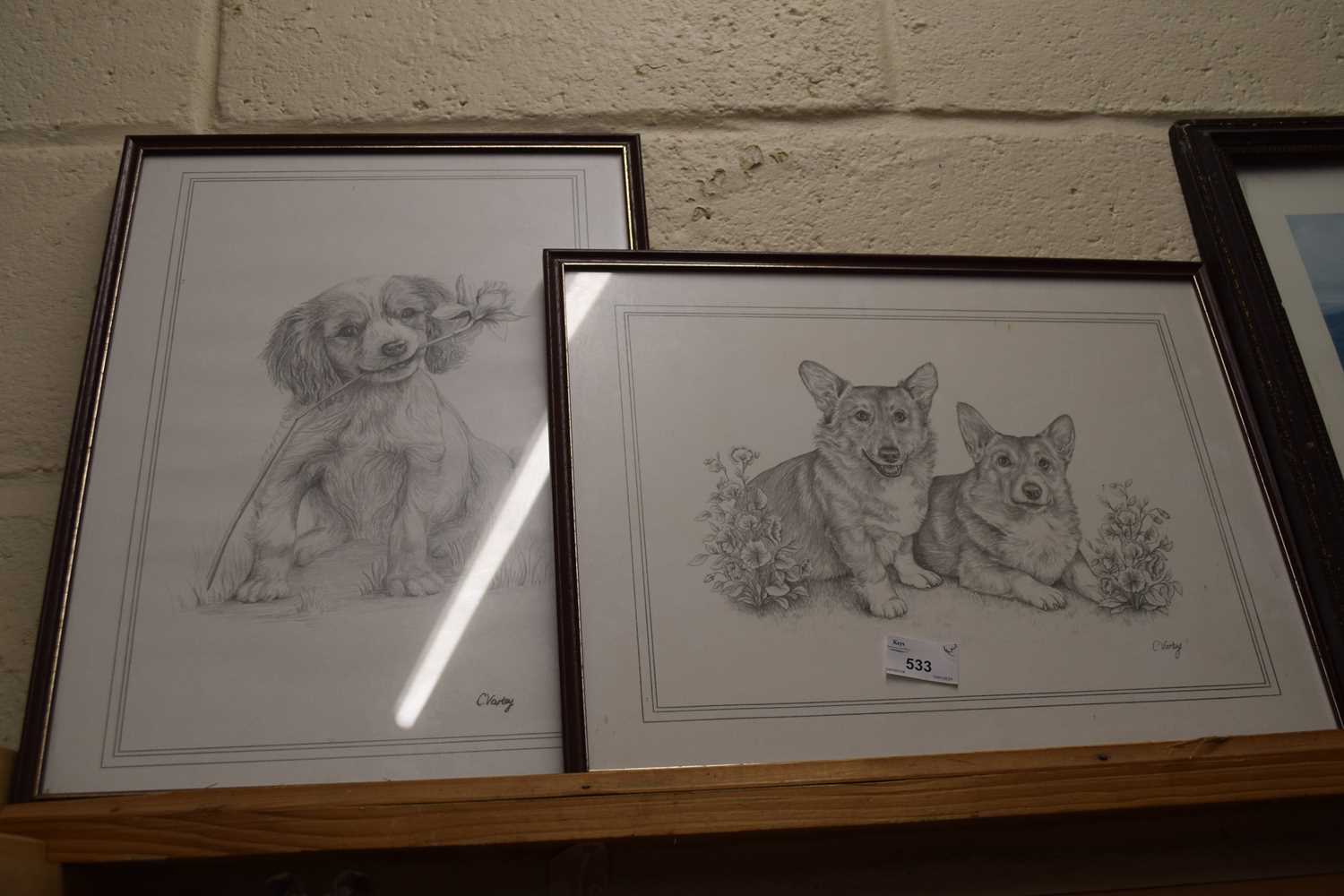 Three prints of dogs, framed