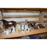 Quantity of assorted animal figurines to include horses, cats etc