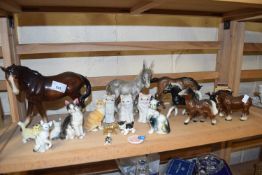 Quantity of assorted animal figurines to include horses, cats etc