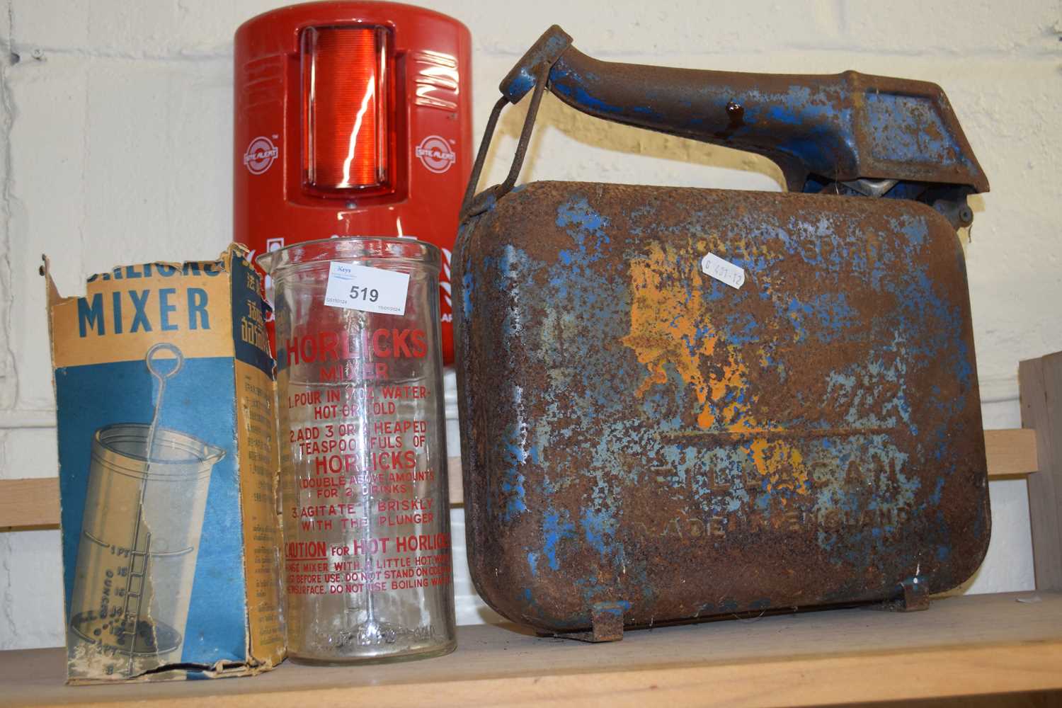 A vintage glass Horlicks jug and a vintage oil can