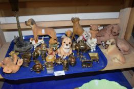Quantity of assorted figurines to include dogs, bears, miniature brass ware etc
