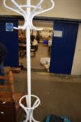 A cream painted coat stand