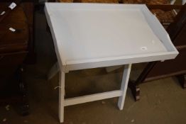 A modern pale grey folding tray table