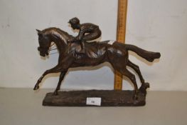 Bronzed resin figure of horse and jockey