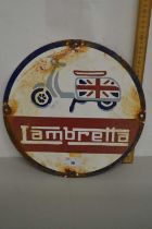 An enamel Lambretta sign