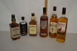 Five bottles of various whisky to include Jack Daniels, Bells, Southern Comfort and Famous Grouse