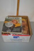 A box of Playboy magazines