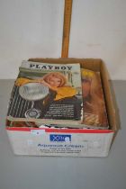 A box of Playboy magazines