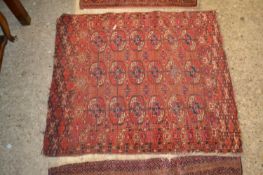 Small Middle Eastern wool floor rug decorated with lozenges, 107cm long