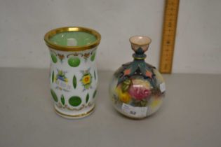 A Hadleys Worcester onion formed vase with rose decoration together with a small Bohemian overlaid