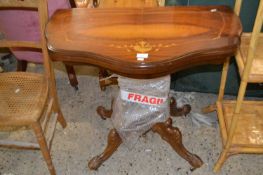 A reproduction inlaid pedestal card table with green baize lined interior, 84cm wide