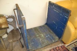 A blue painted wood and metal framed high sided barrow