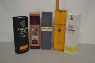 A group of five bottles of whisky to include Highland Park, Famous Grouse, Abrachan, Glenmorangie