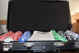 Quantity of Texas Hold-Em tournament poker to include chips, cards and dice, cased set