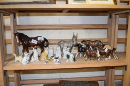 Quantity of model horses, donkeys and cats