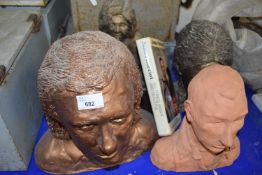Four hand modelled busts