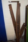 Three various two handled tree saws