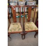 Pair of mahogany dining chairs with drop in upholstery seats
