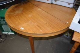 A round pine kitchen table