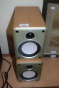 A pair of Denon SC-M53 speakers