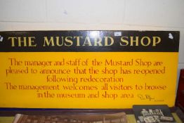 The Mustard Shop wall sign