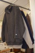 A gentlemans sheepskin coat together with three other jackets