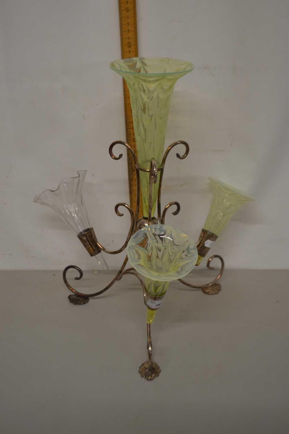 A silver plated epergne centre piece with non matching flutes